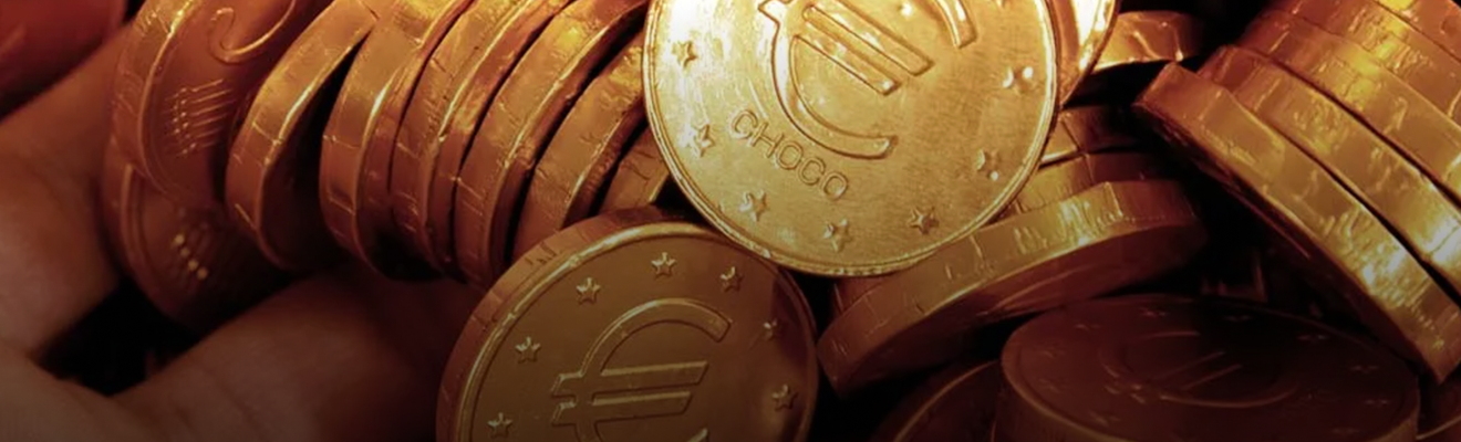 Monete di cioccolato, medaglioni e banconote